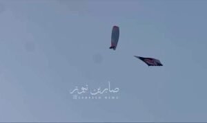 بالفيديو صورة السيد الشهيد حسن نصر الله (رضوان الله عليه) ترفرف في سماء العاصمة …