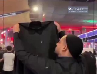 الزيارة الاربعينية قميص الشهيد نيما رجب بور رئيس التحرير في التلفزيون الايراني ا…